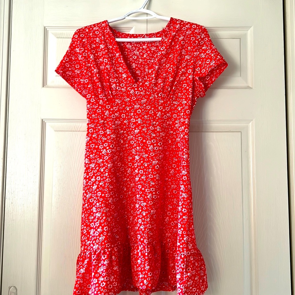 Summer flowy dress. Light and airy material never worn.